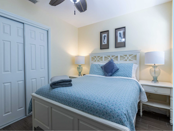 Stroll to our World Class Beach Community Pool Beach Chic Interior.