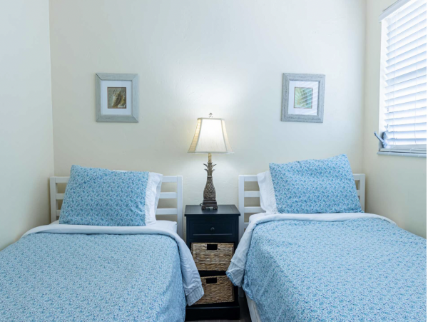 Stroll to our World Class Beach Community Pool Beach Chic Interior.