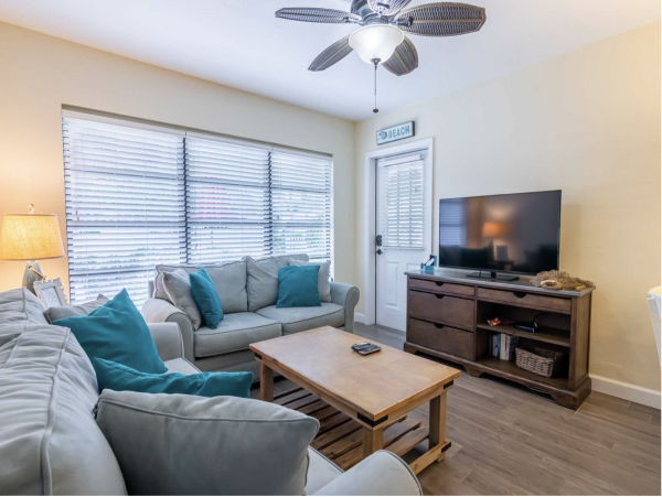 Stroll to our World Class Beach Community Pool Beach Chic Interior.