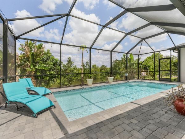 Cape Coral Vacation Home with Private Caged Pool Sleeps 10