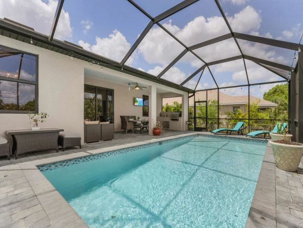 Cape Coral Vacation Home with Private Caged Pool Sleeps 10