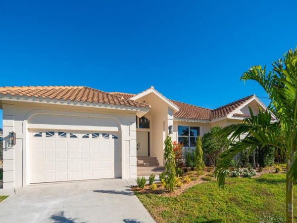 Fabulous 3 Bedroom/2 Bath Waterfront Home with Caged Pool
