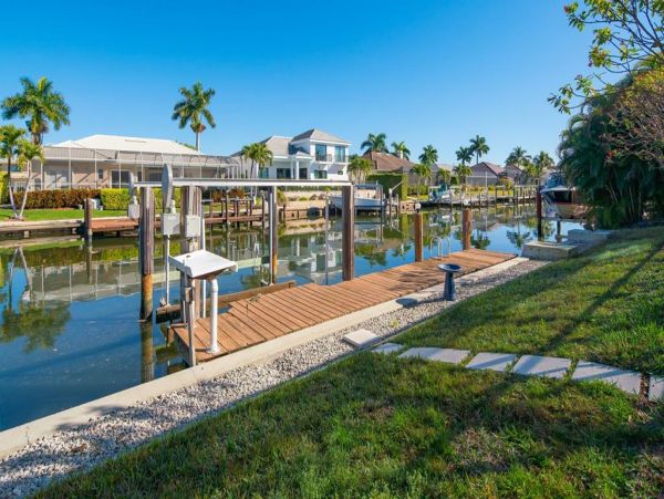 Fabulous 3 Bedroom/2 Bath Waterfront Home with Caged Pool