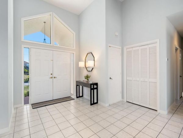 Fabulous 3 Bedroom/2 Bath Waterfront Home with Caged Pool