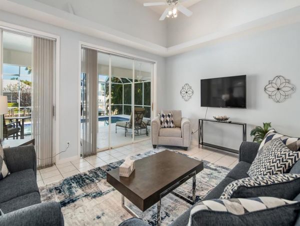 Fabulous 3 Bedroom/2 Bath Waterfront Home with Caged Pool