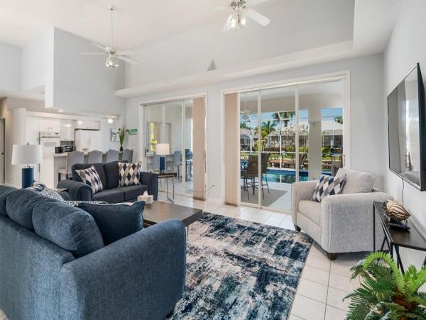 Fabulous 3 Bedroom/2 Bath Waterfront Home with Caged Pool