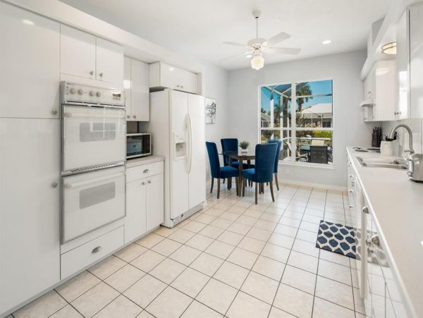Fabulous 3 Bedroom/2 Bath Waterfront Home with Caged Pool