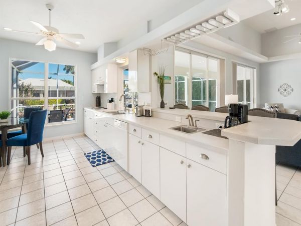 Fabulous 3 Bedroom/2 Bath Waterfront Home with Caged Pool