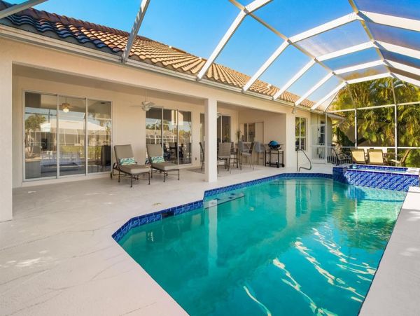 Fabulous 3 Bedroom/2 Bath Waterfront Home with Caged Pool
