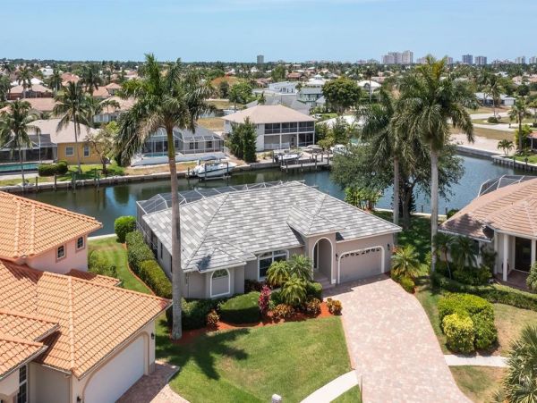 This Three Bedroom Lovely Marco Home Awaits your Arrival