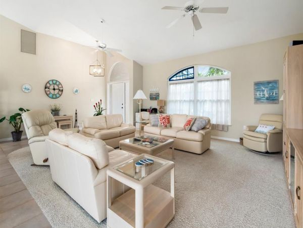 This Three Bedroom Lovely Marco Home Awaits your Arrival