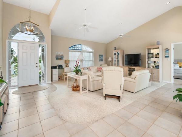 This Three Bedroom Lovely Marco Home Awaits your Arrival