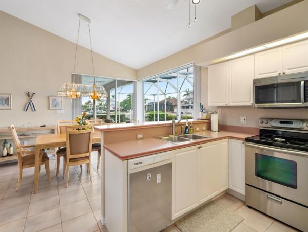 This Three Bedroom Lovely Marco Home Awaits your Arrival