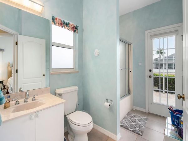 This Three Bedroom Lovely Marco Home Awaits your Arrival