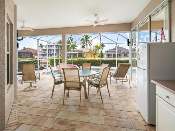 This Three Bedroom Lovely Marco Home Awaits your Arrival