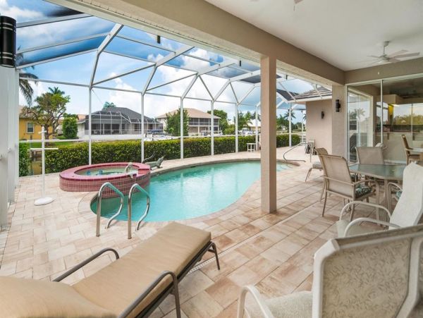This Three Bedroom Lovely Marco Home Awaits your Arrival