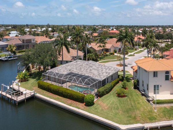 This Three Bedroom Lovely Marco Home Awaits your Arrival