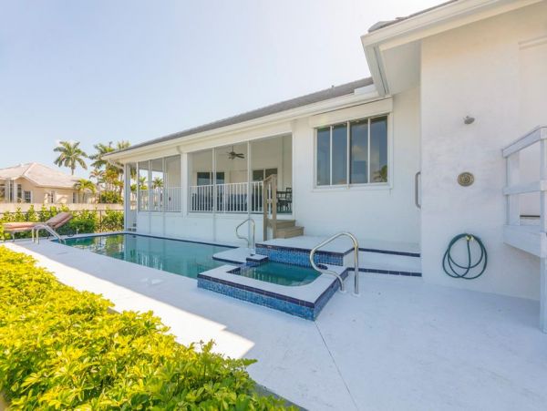 Marco Island Vacation Rental with Pool, Dock & Walk to Tigertail Beach