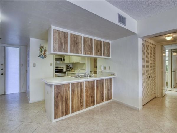 Three Bedroom Condo steps to the Beach