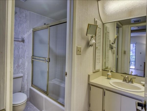Three Bedroom Condo steps to the Beach