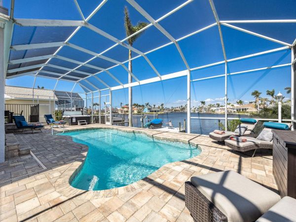 Luxury Vacation Five Bedroom Home with Pool & Canal View