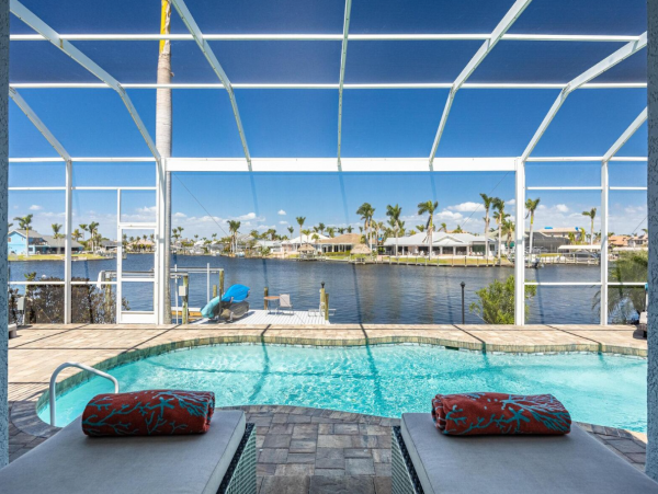 Luxury Vacation Five Bedroom Home with Pool & Canal View