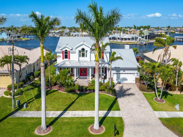 Luxury Vacation Five Bedroom Home with Pool & Canal View
