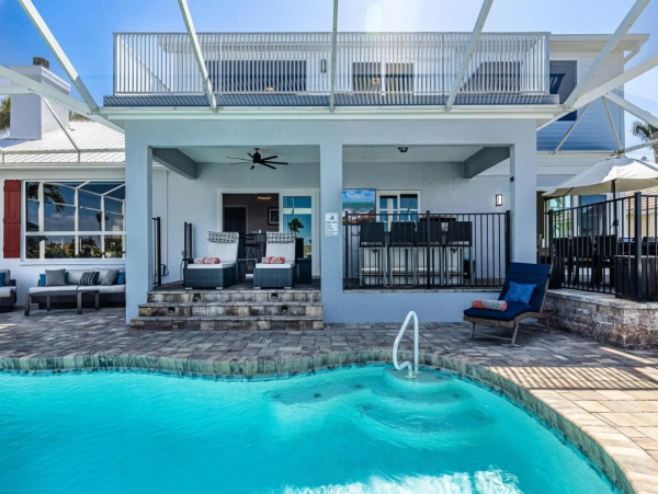 Luxury Vacation Five Bedroom Home with Pool & Canal View