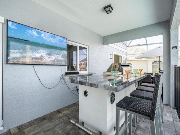 Luxury Vacation Five Bedroom Home with Pool & Canal View