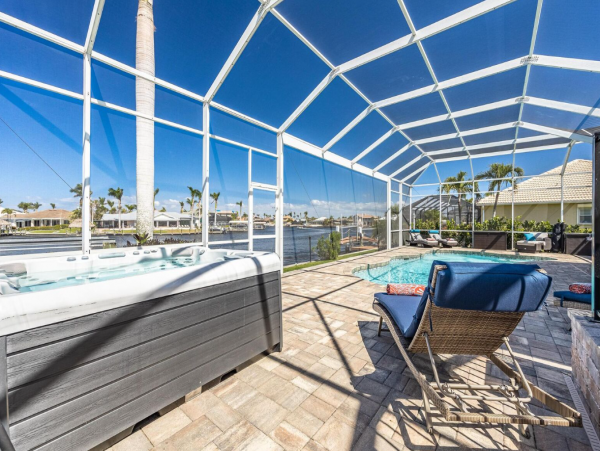 Luxury Vacation Five Bedroom Home with Pool & Canal View