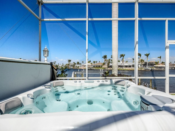 Luxury Vacation Five Bedroom Home with Pool & Canal View