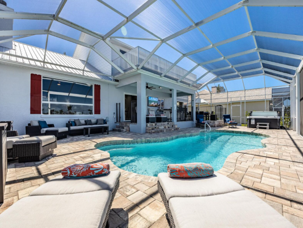 Luxury Vacation Five Bedroom Home with Pool & Canal View