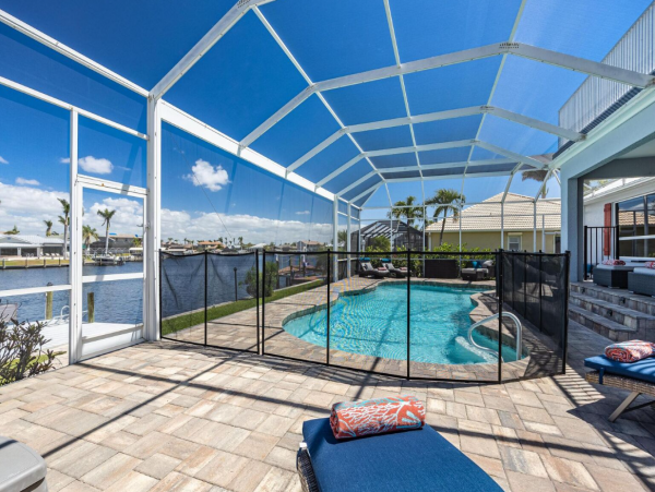 Luxury Vacation Five Bedroom Home with Pool & Canal View