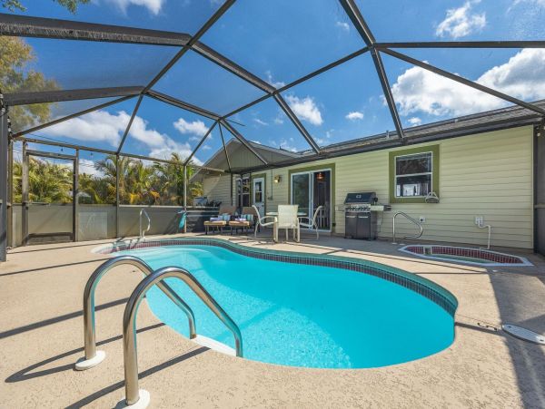 Three Bedroom Rental Home with Caged Pool in Cape Coral