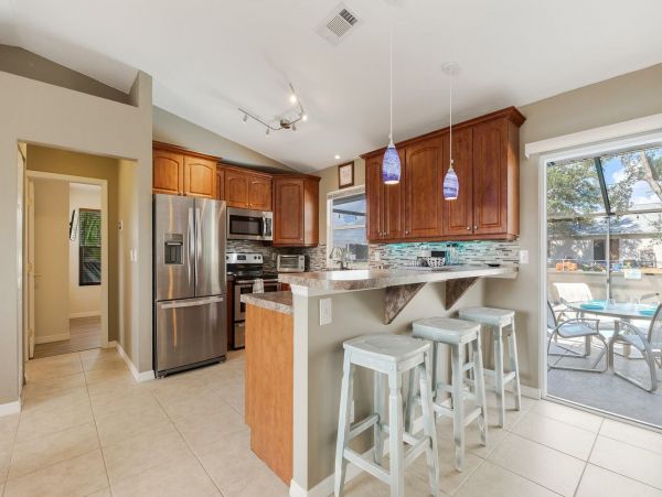 Three Bedroom Rental Home with Caged Pool in Cape Coral