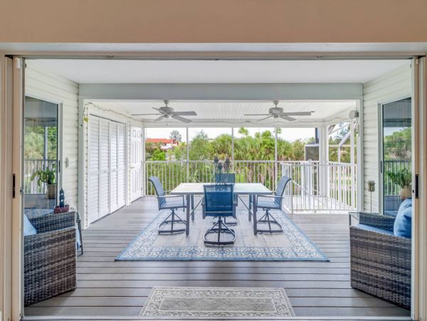 Great Outdoor Living Space with TV, Heated Pool & Outdoor Grill