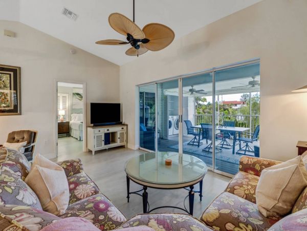 Great Outdoor Living Space with TV, Heated Pool & Outdoor Grill