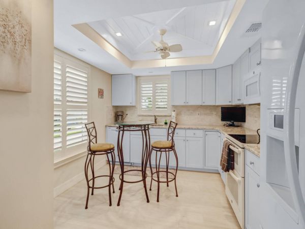 Great Outdoor Living Space with TV, Heated Pool & Outdoor Grill