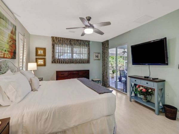 Great Outdoor Living Space with TV, Heated Pool & Outdoor Grill