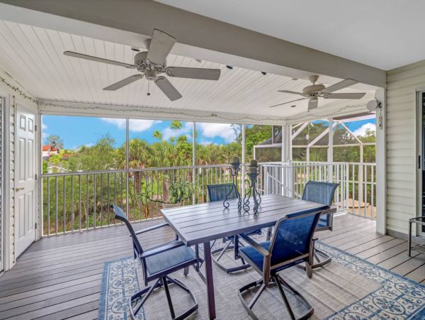 Great Outdoor Living Space with TV, Heated Pool & Outdoor Grill