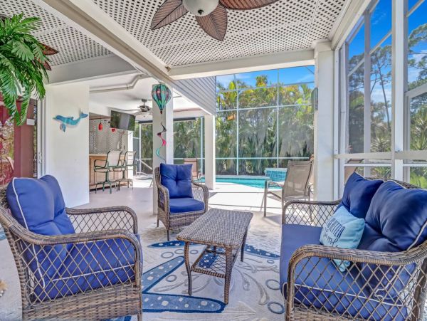 Great Outdoor Living Space with TV, Heated Pool & Outdoor Grill