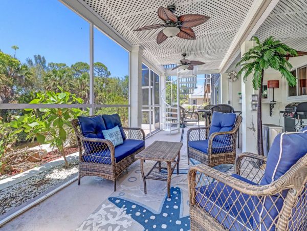 Great Outdoor Living Space with TV, Heated Pool & Outdoor Grill