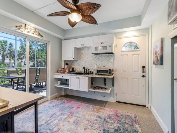 Great Outdoor Living Space with TV, Heated Pool & Outdoor Grill