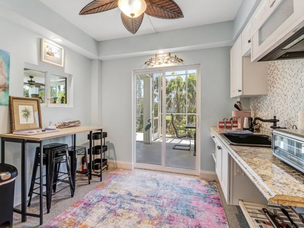 Great Outdoor Living Space with TV, Heated Pool & Outdoor Grill