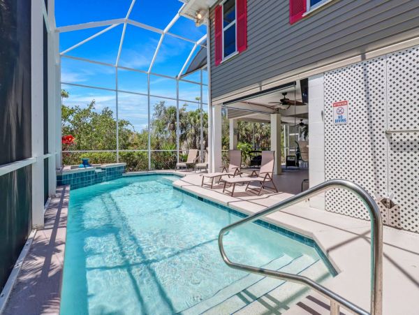 Great Outdoor Living Space with TV, Heated Pool & Outdoor Grill