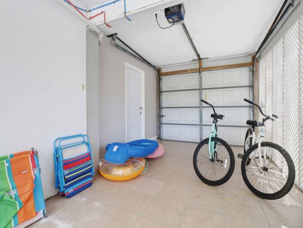 Great Outdoor Living Space with TV, Heated Pool & Outdoor Grill