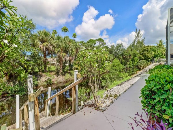 Great Outdoor Living Space with TV, Heated Pool & Outdoor Grill