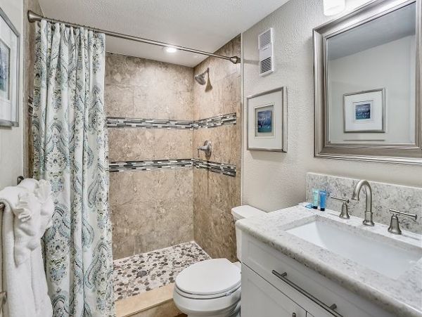 Treasure Island Beachfront Condo Luxury Oceanfront Vacation Rental with Pool & Bay Views