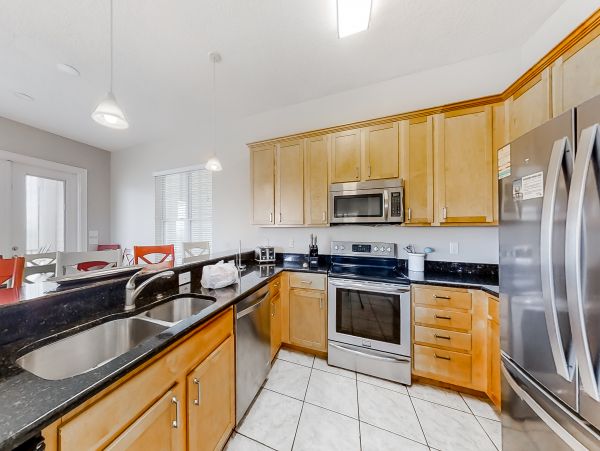 Orange Beach 8 Bedroom Home with Shared Pool & Grill Sleeps 20