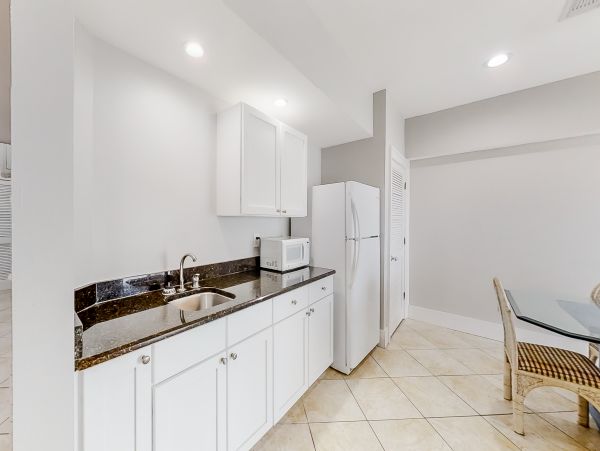 Orange Beach 8 Bedroom Home with Shared Pool & Grill Sleeps 20